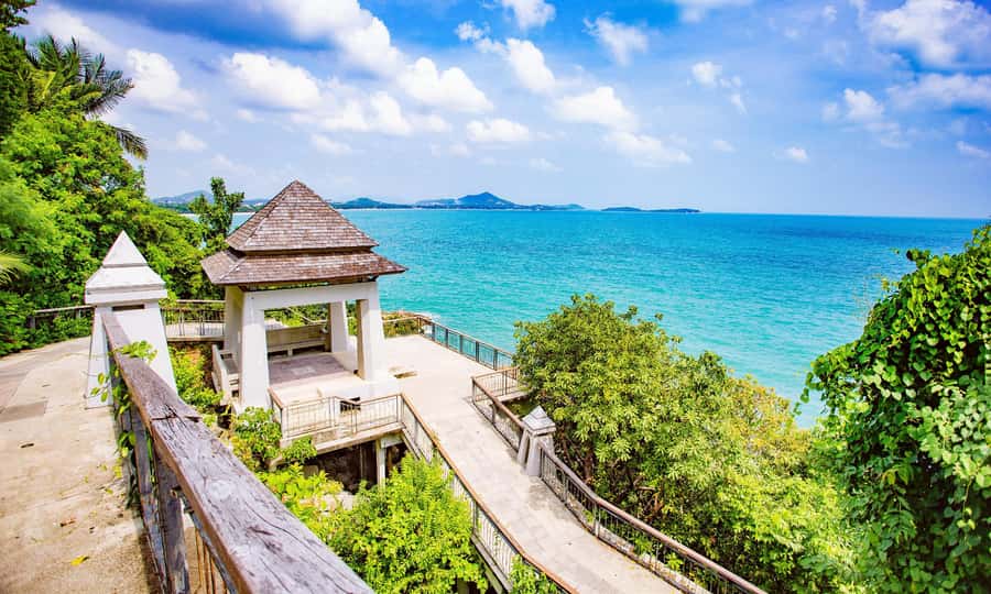 Koh Samui: Half-Day Highlights Tour with Hotel Transfers - Wat Plai Laem and Wat Phra Yai: Golden Accents and Temple Atmosphere