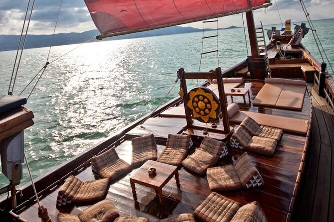 Koh Samui to Koh Phangan Island Full-Day Cruise with Sunset - Thong Nai Pan Noi beach break: sun time, optional massage, and tropical drinks
